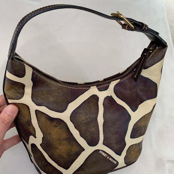 Dooney & Bourke Handbags - Dooney & Bourke cream & brown sm canvas bucket bag